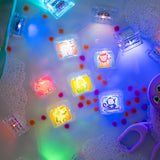 Découvrez les cubes lumineux Glo Pals Animaux ✨ ! 6 cubes sensoriels qui s’illuminent dans l’eau, parfaits pour le bain ou le jeu d’éveil dès 3 ans.