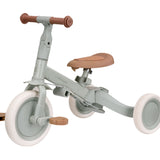 Découvrez le tricycle évolutif 4 en 1 Pure Sage 🌿 : poussette, tricycle, draisienne et vélo. Idéal de 1 à 5 ans pour développer équilibre et motricité en toute sécurité.