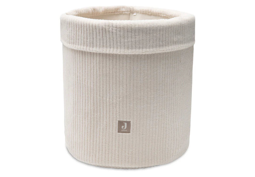 Panier de rangement Cloudy Rib Oatmeal, élégant et pratique en tissu côtelé. Idéal pour organiser le coin à langer ou décorer la chambre de bébé.