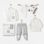 Coffret bébé 5 pièces en coton 100% pour la sortie de maternité. Inclut bavoir, bonnet, pantalon, brassière et gilet assorti, pour un accueil tout en douceur dès la naissance.