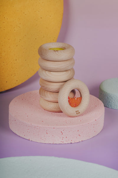 Donut jouet d’éveil sensoriel orange – jouet en bois bébé PETIT BOOM