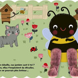 Livre animé bébé avec jambes marionnettes à manipuler pour développer la motricité fine, l'imagination et le sens de l'observation.