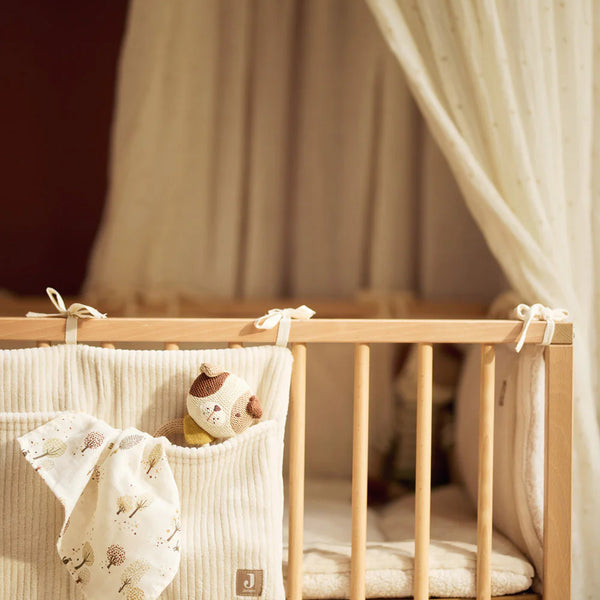 rangement barreaux lit bébé