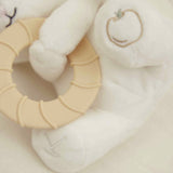 Peluche avec anneau de dentition silicone dès 3 mois. Apaise les gencives et réconforte bébé.