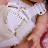 Coquille Tiny Harlow Vichy lilas et cerise pour transporter votre poupée partout. Poignée, sangles sécurisées et housse amovible lavable. Jouet d’imitation pour enfants dès 3 ans.