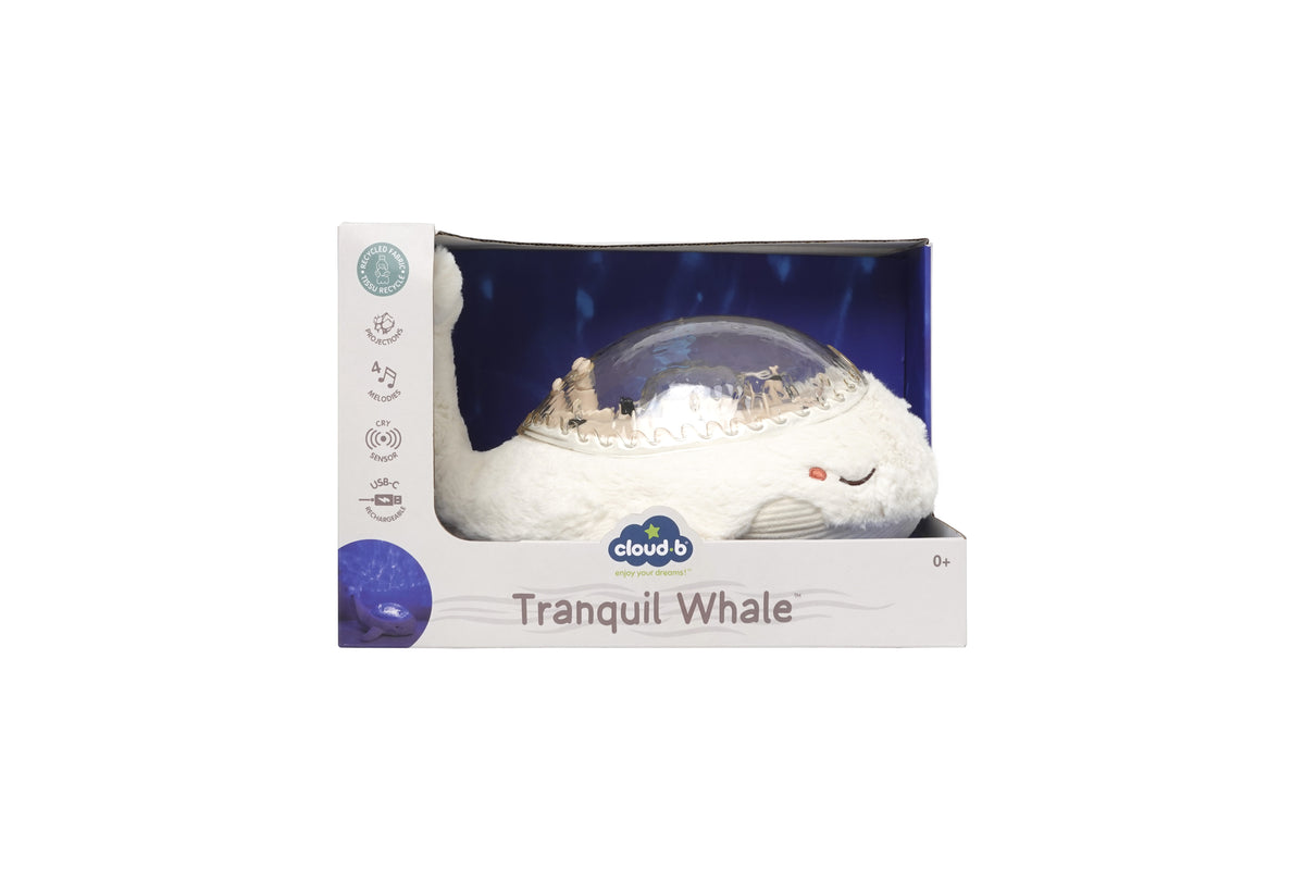 Veilleuse bébé Tranquil Whale™ blanche rechargeable : projections océaniques, bruits blancs, capteur de pleurs et minuterie. Idéale dès la naissance et parfaite en cadeau de naissance.