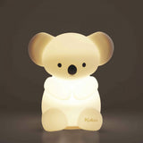 Veilleuse bébé en silicone souple dès la naissance. Lumière douce, rechargeable USB et format nomade.