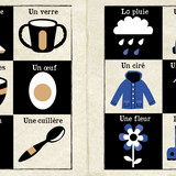 Bébé manipulant livre tissu noir et blanc, exploration tactile sécurisée