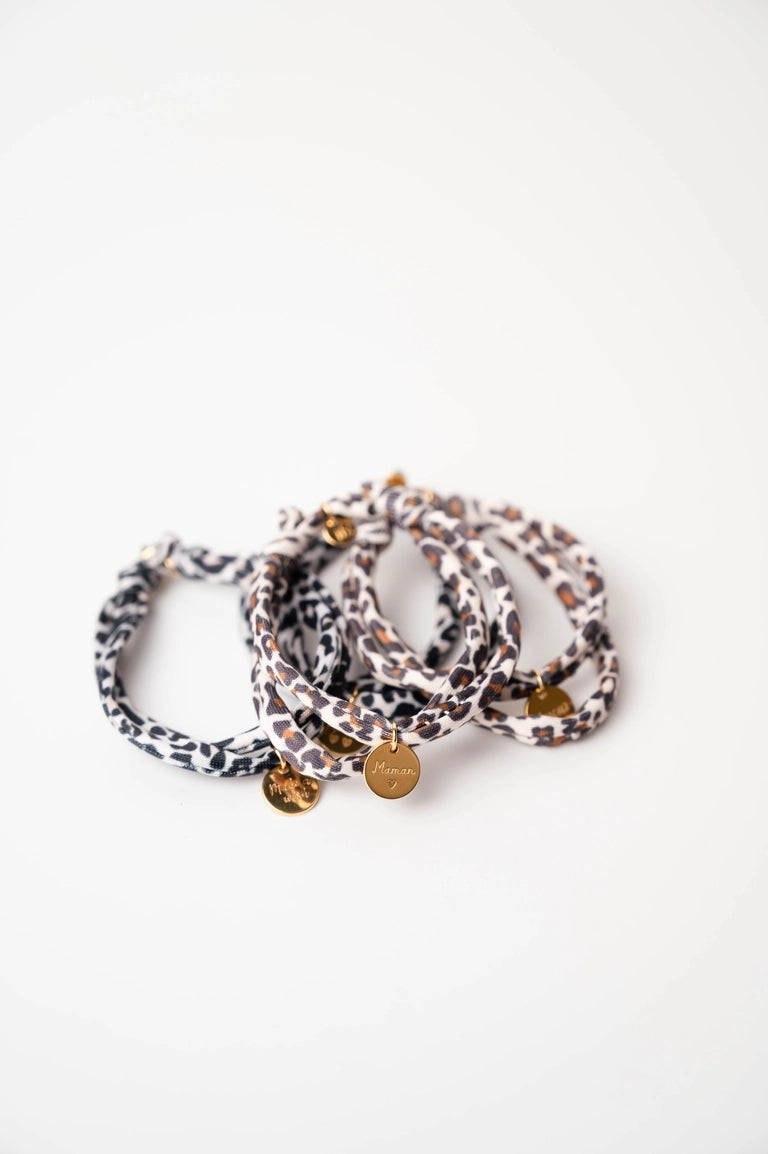 Bracelet ajustable avec médaille amour dorée