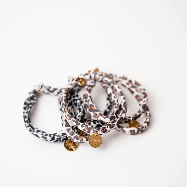 Bracelet ajustable avec médaille amour dorée