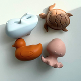 activité ludique bain enfant figurines flottantes