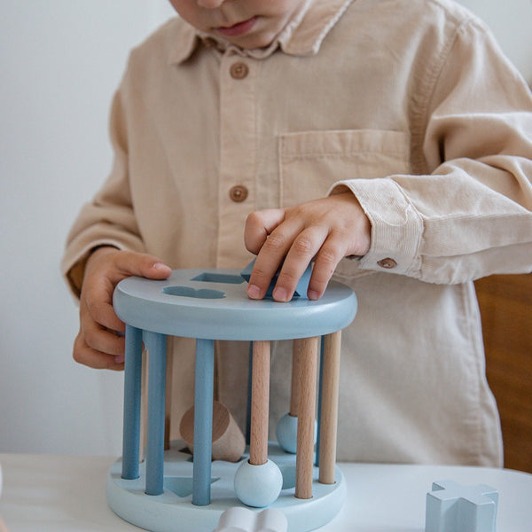 Roue trieur de formes en bois – Bleu