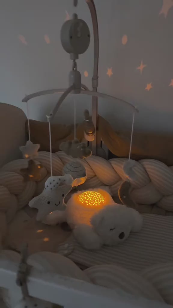 veilleuse à projection pour la chambre de bebe marque nattou modèle ours polaire. Projecteur d'étoiles petit coeur salé