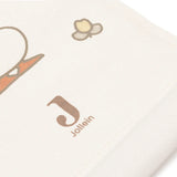 Toise murale bébé en coton Miffy Family Farm. Idéale pour suivre la croissance de l’enfant et décorer la chambre avec douceur.