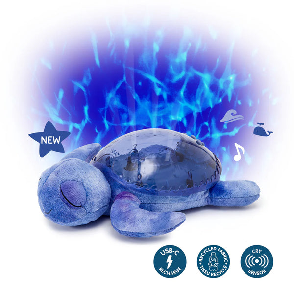 Veilleuse bébé Tranquil Turtle™ rechargeable : projections de vagues océaniques, bruits blancs, capteur de pleurs et minuterie. Idéale dès la naissance et parfaite comme cadeau de naissance.